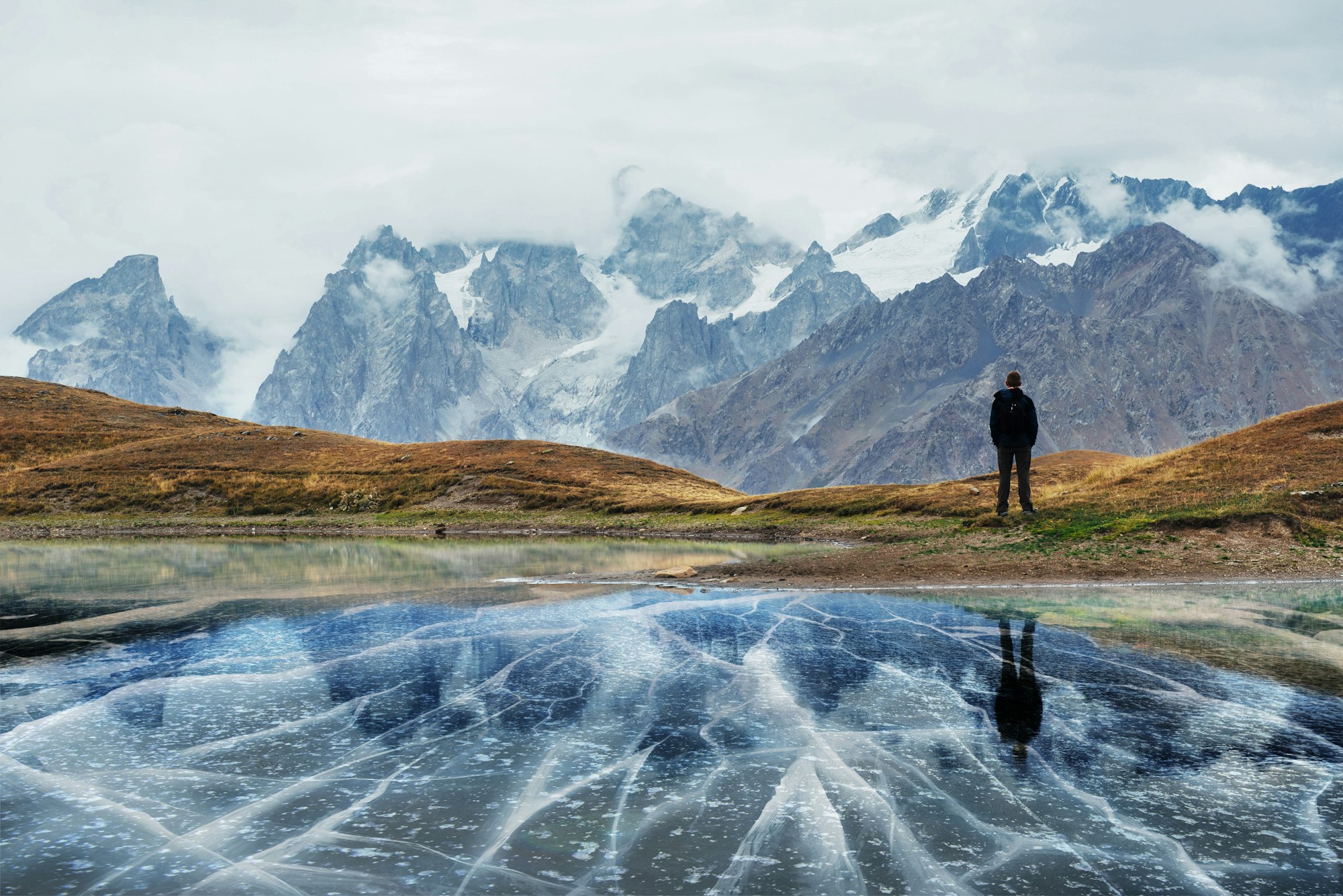 Landscape on mountain frozen lake Koruldi. Upper Svaneti, Georgia, Europe. Caucasus